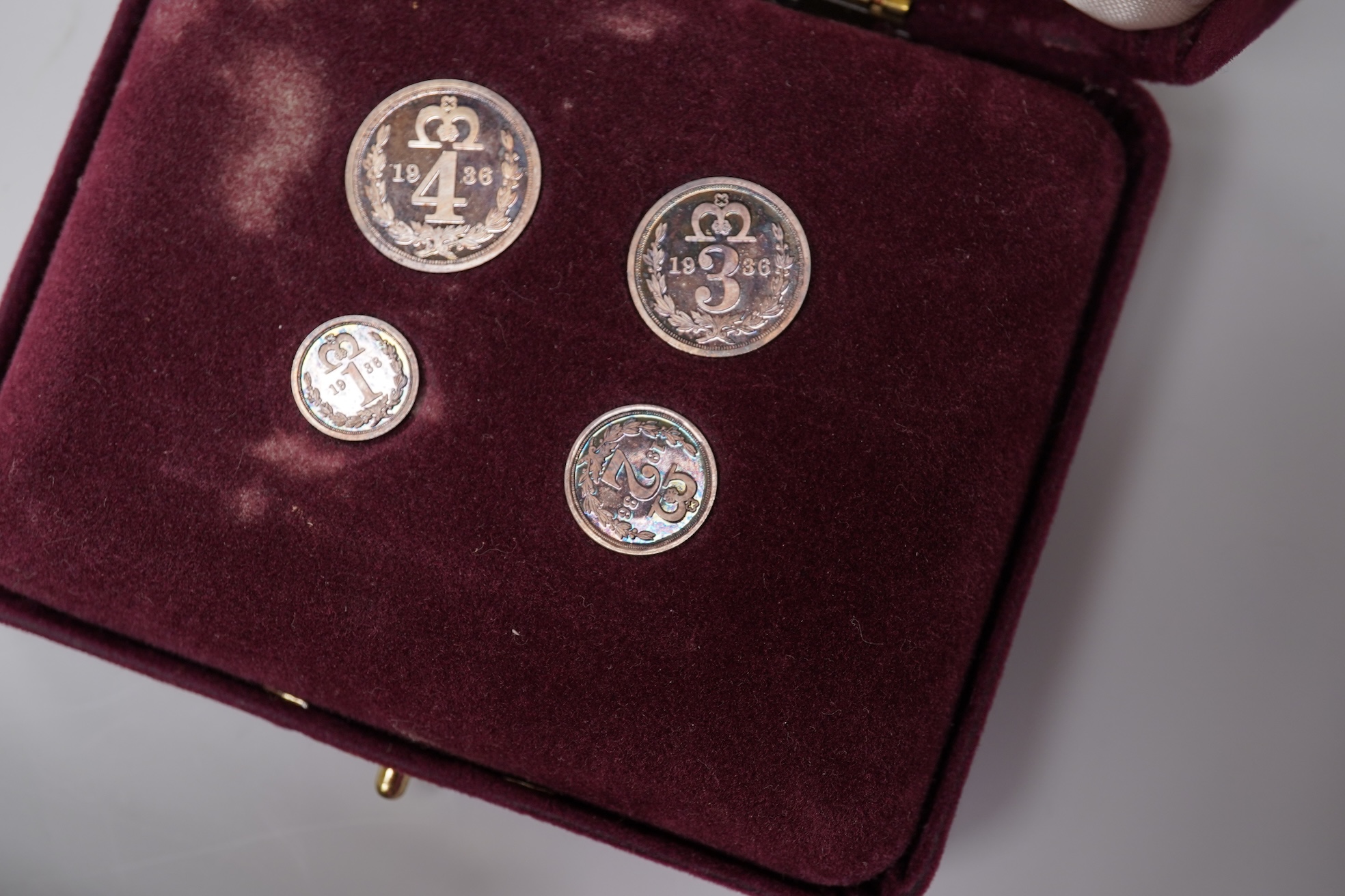 A small group of British coinage to include a 1936 Maundy set, together with two Foresters medals, one silver